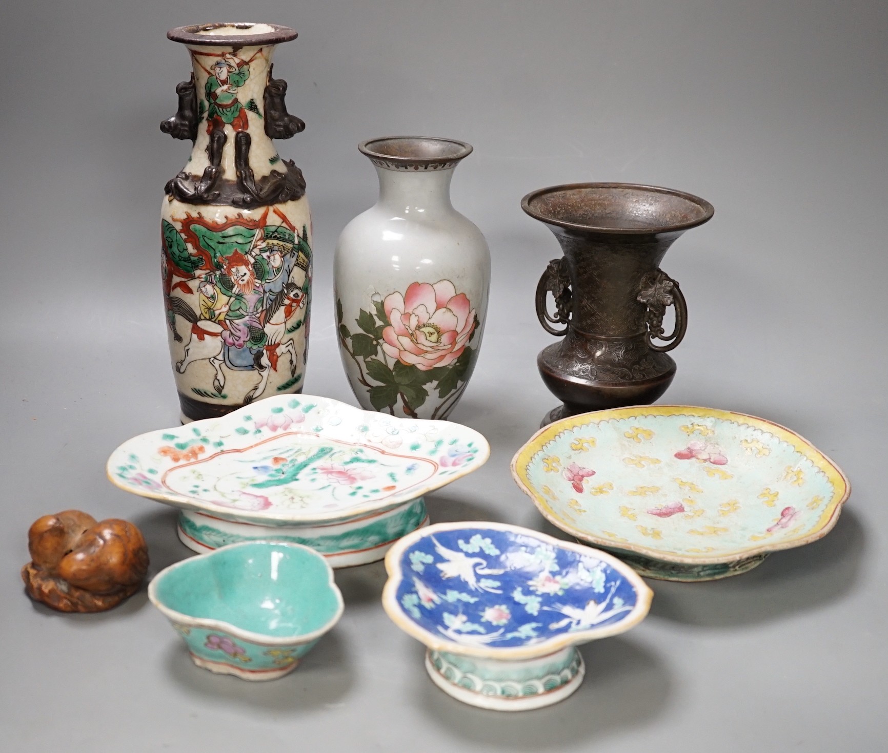 A group of 19th century Chinese porcelain dishes and a vase, and a Japanese ‘bird’ carving etc.